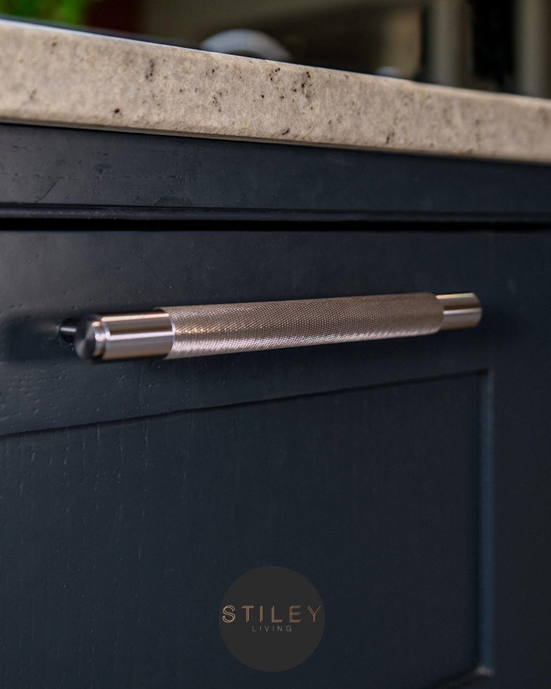 Cabinet drawer Cabinet drawer handle on a blue cabinet shelving