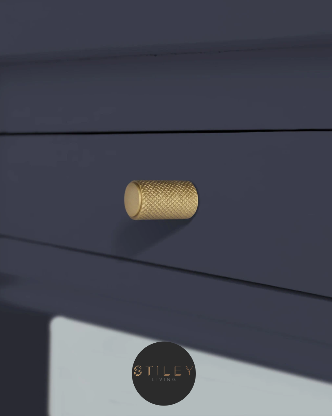 Cabinet knobs Blue cabinet with gold knurled knob handle